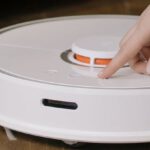 Robot Vacuums - White and Orange Plastic Container