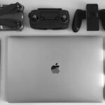 Gadgets - Silver Macbook Surrounding Black Electronic Devices