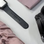 Fitness Trackers - Black and Silver Headphones Beside Red and Black Headphones