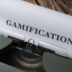 Gamification - A typewriter with the word gamification on it