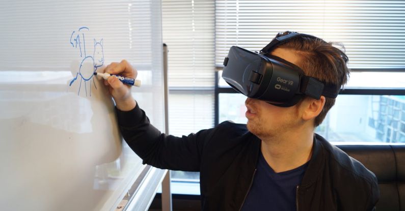 Virtual Reality - Person Wearing Black Vr Box Writing On White Board